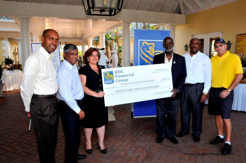 The Ranfurly Home for Children was presented with a cheque for $21,000.00 and $2000.00 in raffle ticket sales representing the total proceeds from the 2013 RBC Client Invitational Golf Tournament.  Pictured left to right are: Lester Cox, Market Head, Business Banking, RBC; Suresh Sookoo, CEO, Caribbean Banking, RBC; Alexandria Lynch, President, Ranfurly Home for Children; Alexander Roberts, Administrator, Ranfurly Home for Children; Nathaniel Beneby, Market Head, Personal Banking, RBC; and Brian Knowles, Vice President, Corporate Banking, RBC.