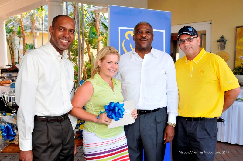 Closest to the Pin Winner Katherine Elza (center) along with Lester Cox, Market Head, Business Banking, RBC; Nathaniel Beneby, Market Head, Personal Banking, RBC; and Brian Knowles, Vice President, Corporate Banking, RBC.
